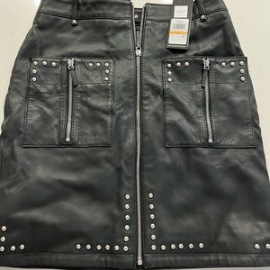 Brand new black leather skirt. Zipper goes all the way down .